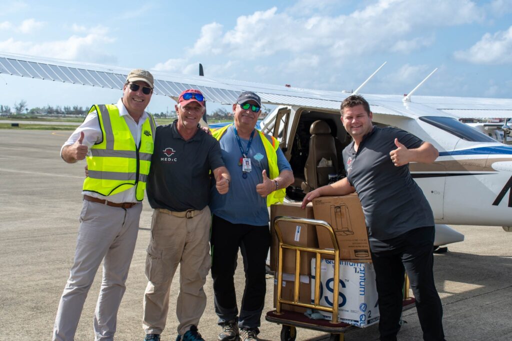 MediCorps and Doctors Hospital team with supplies brought over to Jamaica